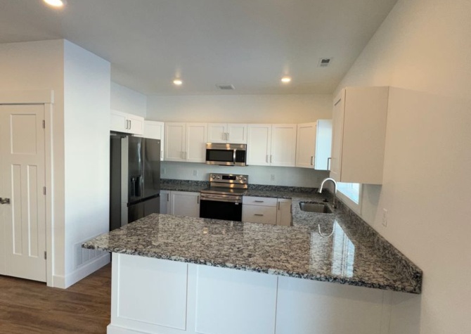 Houses Near Brand New & Modern 2-Story Town Home for Rent in Sugar Mills Townhome Division! 3 Bedroom, 2.5 Bathroom & Garage- Real Property Management