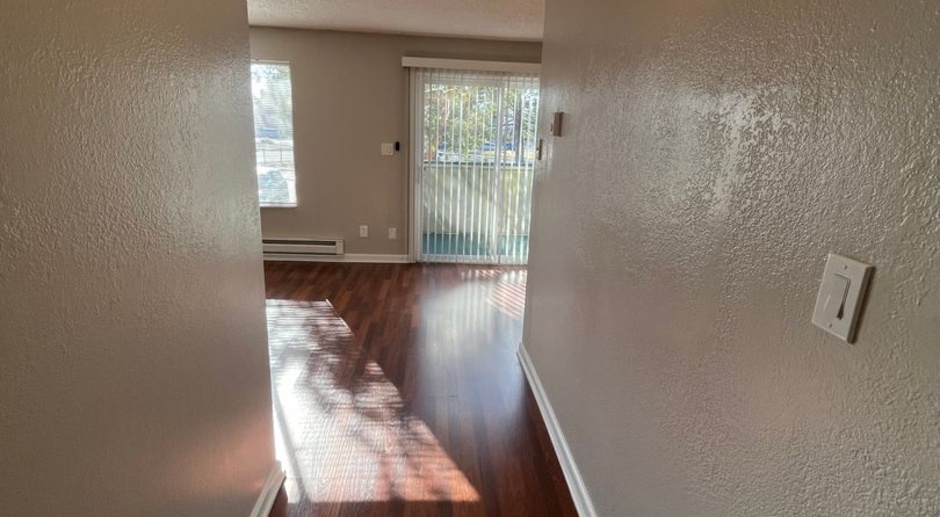 Renovated, Spacious, Upstairs 2 bedroom condo with Washer/Dryer, Pool & Parking
