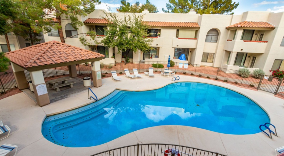 Two Bedroom Condo overlooking pool in North Central Gated Complex.