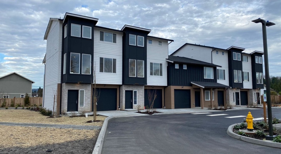 **LAST BRAND NEW LEFT** 4-bedroom, 3-bathroom townhome with a garage in Auburn!